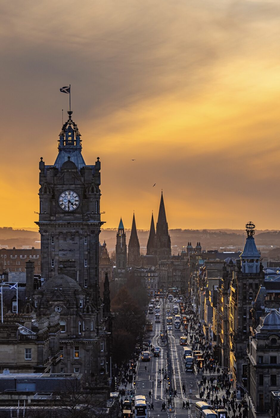 Edinburgh clock tower and old town at golden hour